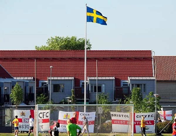 Bristol City fans decorate the ground with flags below the Swedish flag