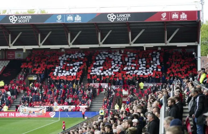 Framed Print : Bristol City Fans Honor Gerry Gow with Flags and Banners at Ashton Gate Stadium during Bristol City vs Blackburn Rovers Match