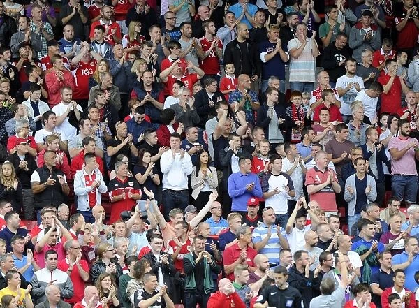 Bristol City Fans Honor Mark Saunders with Minutes Applause during Bristol City v MK Dons Match