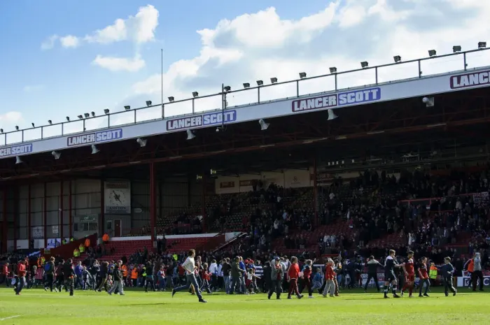 Framed Print : Bristol City Fans Invade Pitch After 3-1 Loss to Huddersfield in Championship Match Framed Print : Bristol City Fans Invade Pitch After 3-1 Loss to Huddersfield in Championship Match