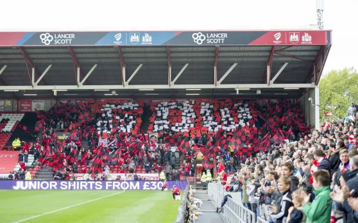 Framed Print : Bristol City Fans Pay Tribute to Gerry Gow with Flags and Banners at Ashton Gate Stadium