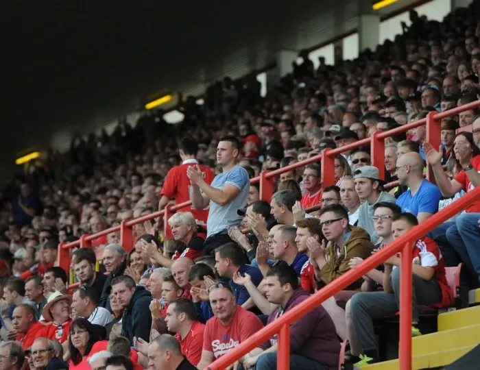 Framed Print : Bristol City Fans Pay Tribute to Mark Saunders with Minutes Applause during Bristol City v MK Dons Match Framed Print : Bristol City Fans Pay Tribute to Mark Saunders with Minutes Applause during Bristol City v MK Dons Match