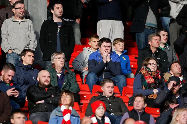 Bristol City Fans Showing Nervous Anticipation at Barnsley's Oakwell Stadium, 2014