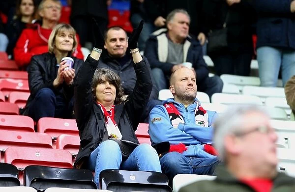 Bristol City Fans in Full Support at Wigan's DW Stadium
