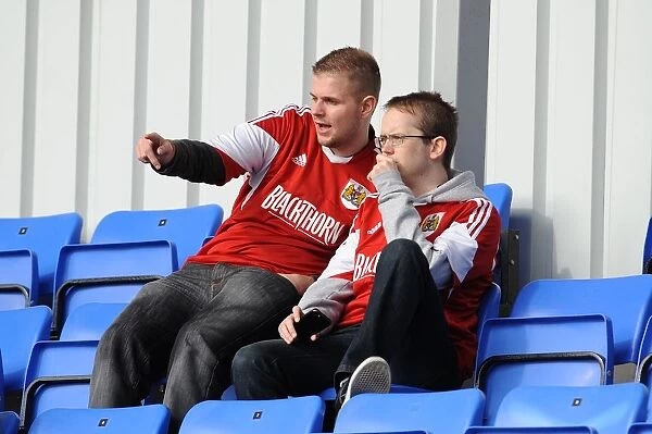 Bristol City Fans in Full Swing: Cheering at Shrewsbury Town's New Meadow during Sky Bet League One Match, March 2014
