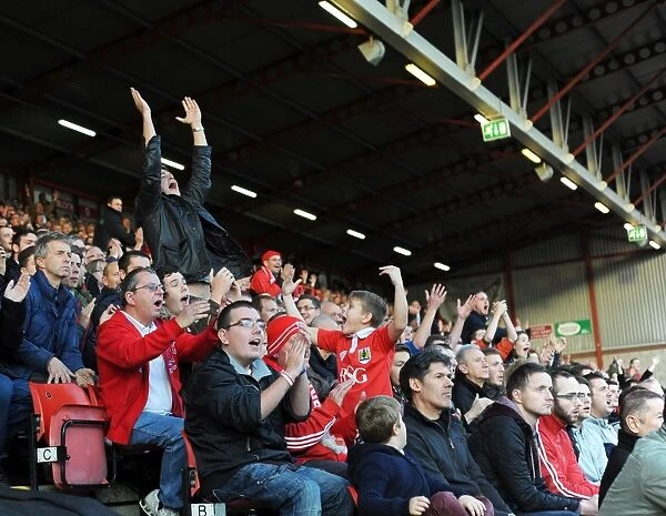 Bristol City Fans in Full Swing: Cheering on Their Team against Preston North End at Ashton Gate, 2014