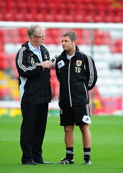 Bristol City FC: Assistant Manager Tony Docherty in Deep Discussion with David Lloyd during Pre-Season Open Day