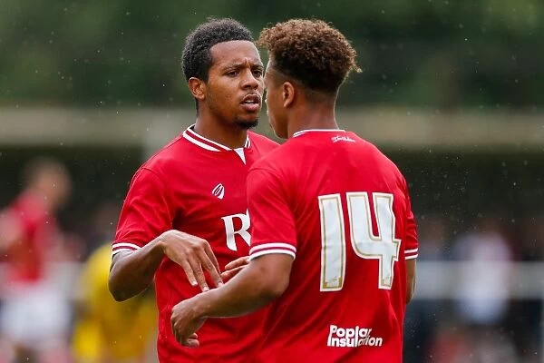 Bristol City FC: Bobby Reid and Korey Smith Embrace Victory After Goal in Pre-Season Community Match