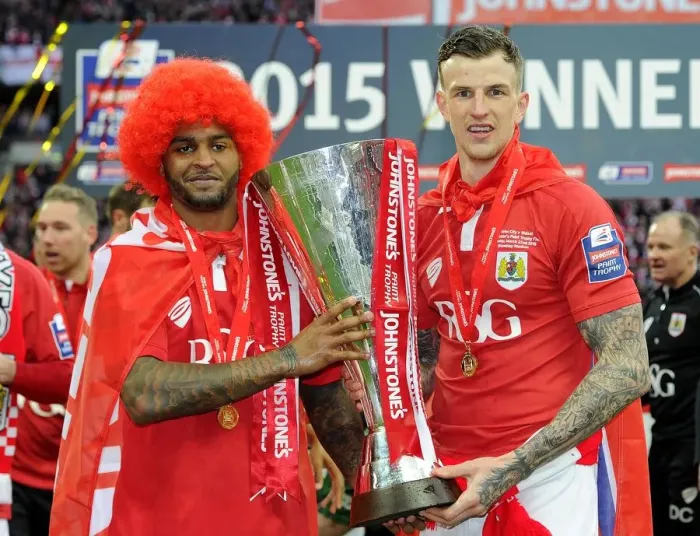 Framed Print : Bristol City FC Celebrate Johnstone's Paint Trophy Victory: Mark Little and Aden Flint Lift the Trophy after Beating Walsall at Wembley Stadium Framed Print : Bristol City FC Celebrate Johnstone's Paint Trophy Victory: Mark Little and Aden Flint Lift the Trophy after Beating Walsall at Wembley Stadium