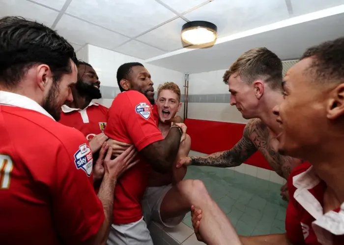 Framed Print : Bristol City FC: Champions Triumph - Players Celebrate in Ice Baths after Securing League One Title