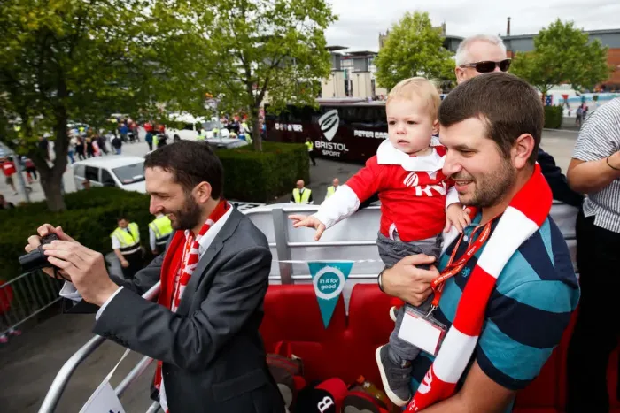 Framed Print : Bristol City FC: Champions Triumph - Vice Chairman Jon Lansdown and Son Amidst the Cheers of the Bus Parade Crowd Framed Print : Bristol City FC: Champions Triumph - Vice Chairman Jon Lansdown and Son Amidst the Cheers of the Bus Parade Crowd