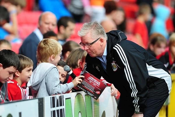 Bristol City FC: David Lloyd Engages with a Fan at Pre-Season Open Day