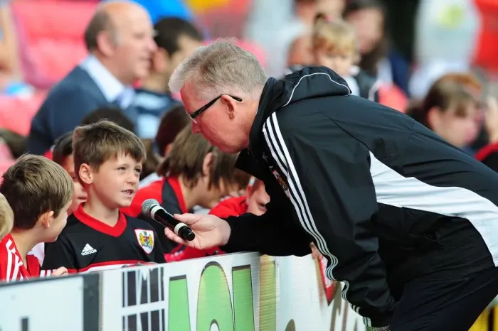 Framed Print : Bristol City FC: David Lloyd Engages with a Fan at Pre-Season Open Day Framed Print : Bristol City FC: David Lloyd Engages with a Fan at Pre-Season Open Day