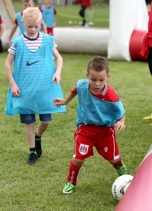 Framed Print : Bristol City FC: Engaging Fans with Community Foundation Activities at Hengrove Athletic Pre-Season Friendly