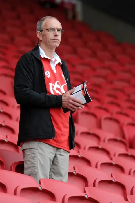 Framed Print : Bristol City FC: A Fan's Intense Focus at Ashton Gate during Bristol City vs MK Dons (Sky Bet Championship)