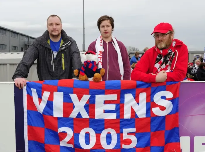 Framed Print : Bristol City FC Fans with Vixens Flag at Gifford Stadium during BAWFC vs Chelsea Ladies FA WSL Match