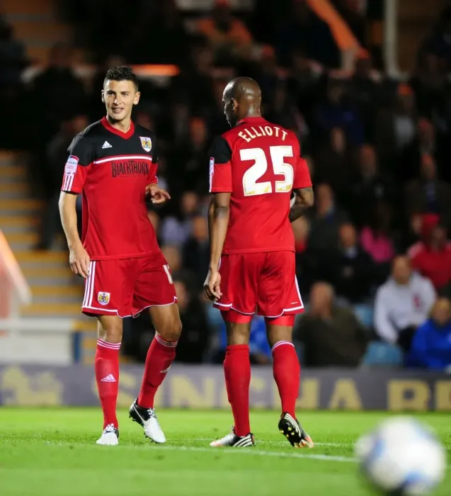 Framed Print : Bristol City FC: James Wilson and Marvin Elliott Clash in Championship Match against Peterborough United Framed Print : Bristol City FC: James Wilson and Marvin Elliott Clash in Championship Match against Peterborough United