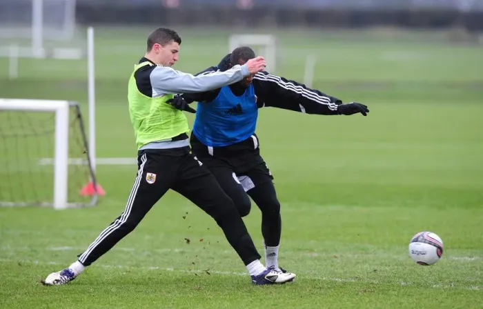 Framed Print : Bristol City FC: Kalifa Cisse and James Wilson Battle for the Ball during Training Session Framed Print : Bristol City FC: Kalifa Cisse and James Wilson Battle for the Ball during Training Session