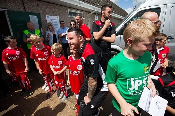 Bristol City FC: Lee Tomlin Engages with Young Fans Before Pre-Season Match Against Hengrove Athletic