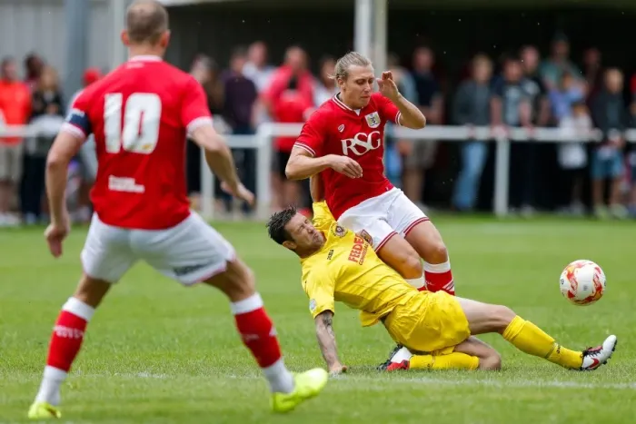 Framed Print : Bristol City FC: Luke Freeman Tackled in Pre-Season Community Match vs. Keynsham Town & Brislington