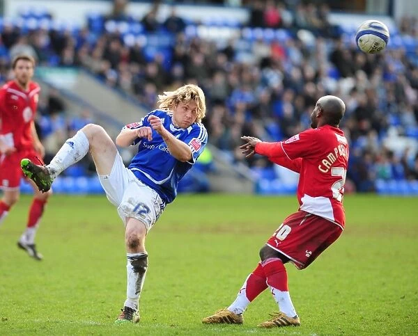 Bristol City FC: Peterborough's Mackail-Smith Clears the Ball in Championship Clash (March 2010)