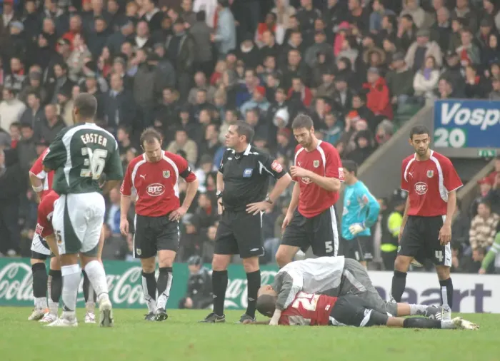 Framed Print : Bristol City FC: Physio in Action during Plymouth Match