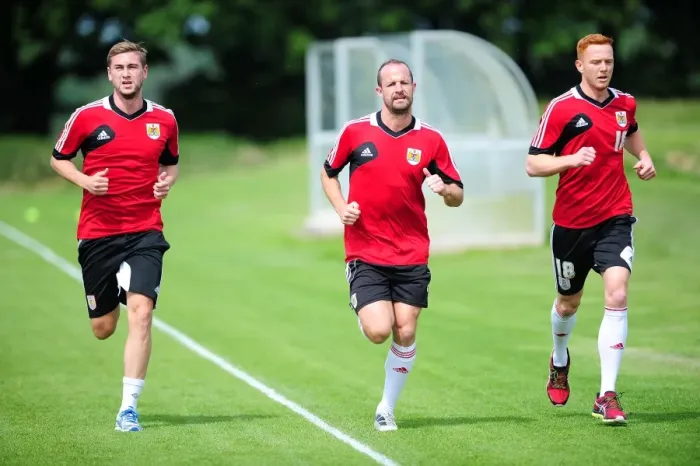 Framed Print : Bristol City FC: Pre-Season Training with Steven Davies, Louis Carey, and Ryan Taylor