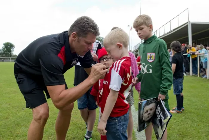 Framed Print : Bristol City FC: Steve Cotterill Engages with Young Fans at Pre-Season Training Session Framed Print : Bristol City FC: Steve Cotterill Engages with Young Fans at Pre-Season Training Session