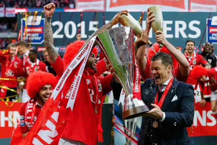 Framed Print : Bristol City FC: Steve Cotterill and Players Celebrate Johnstones Paint Trophy Victory Framed Print : Bristol City FC: Steve Cotterill and Players Celebrate Johnstones Paint Trophy Victory