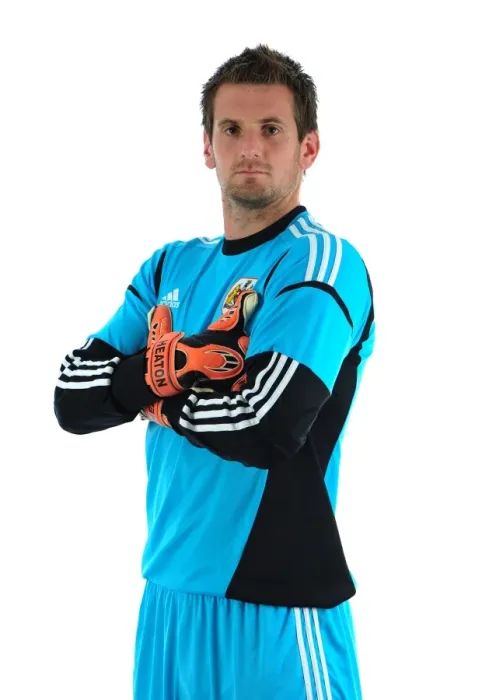 Framed Print : Bristol City FC: Tom Heaton's Focused Expression during Pre-Season Training at Ashton Gate Stadium Framed Print : Bristol City FC: Tom Heaton's Focused Expression during Pre-Season Training at Ashton Gate Stadium