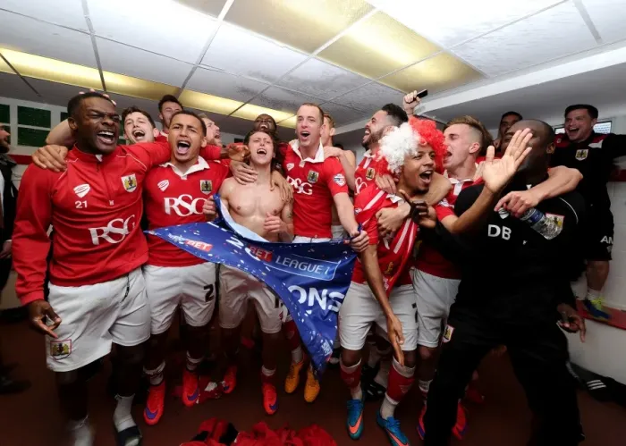 Framed Print : Bristol City FC: Unforgettable Moment - League One Championship Win in the Changing Room