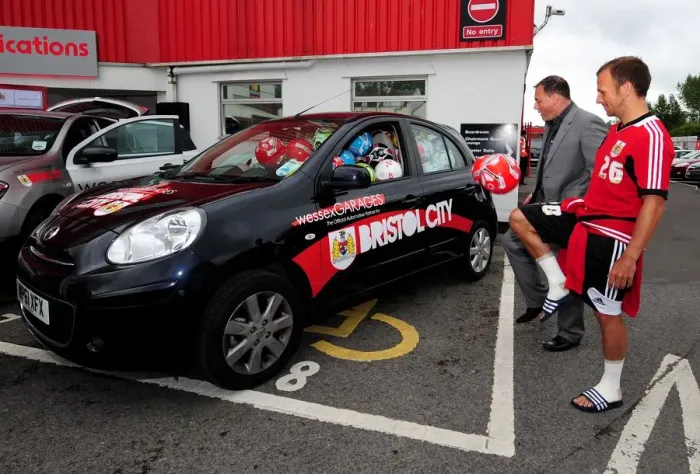 Framed Print : Bristol City FC: Wessex Garages Open Day - Flicking Footballs into a Car