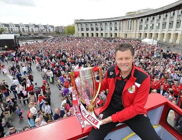 Bristol City FC's Glorious Championship Victory: Steve Cotterill and Jubilant Fans Celebrate with the Trophy