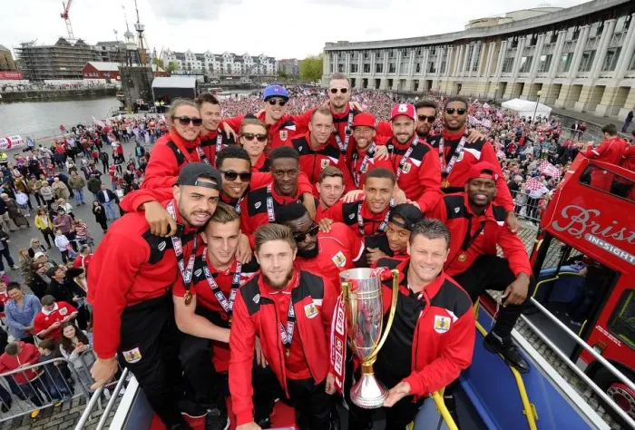 Framed Print : Bristol City FC's League One Victory Celebration: Thousands Rejoice with Players and Manager Framed Print : Bristol City FC's League One Victory Celebration: Thousands Rejoice with Players and Manager