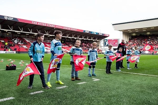 Bristol City Flag-Bearing Fans in Action at Ashton Gate Stadium