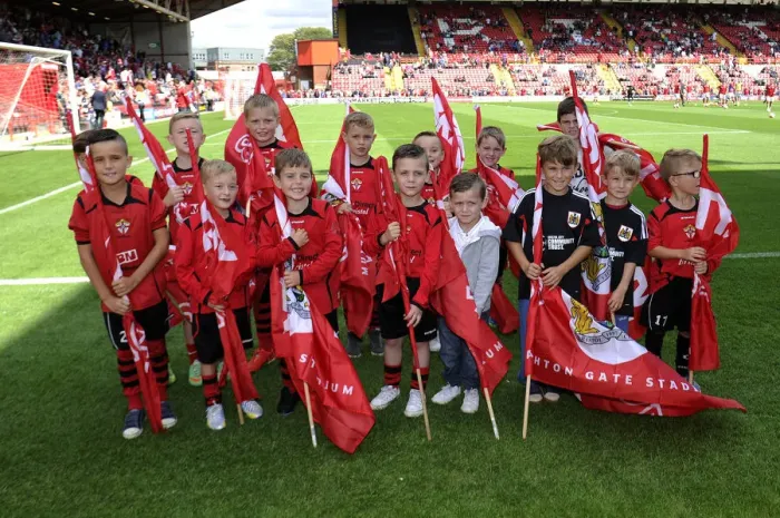 Framed Print : Bristol City Flagbearers in Action at Ashton Gate: Bristol City vs Colchester United, Sky Bet League One Framed Print : Bristol City Flagbearers in Action at Ashton Gate: Bristol City vs Colchester United, Sky Bet League One