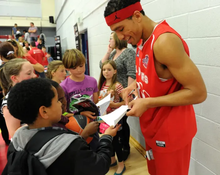Framed Print : Bristol City Football Club: Greg Streete Connects with Fans as He Signs Autographs During Bristol Flyers Basketball Match vs. Plymouth Raiders