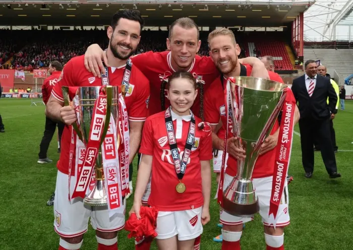 Framed Print : Bristol City Football Club: Champions League One and Johnstones Paint Trophy Victory Celebration - Scott Wagstaff, Greg Cunningham, and Aaron Wilbraham with Daughter Framed Print : Bristol City Football Club: Champions League One and Johnstones Paint Trophy Victory Celebration - Scott Wagstaff, Greg Cunningham, and Aaron Wilbraham with Daughter