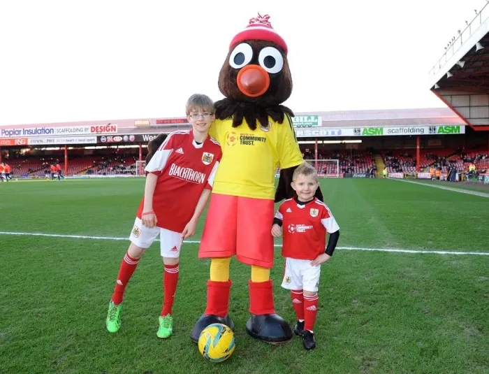 Framed Print : Bristol City Football Club: Mascots Celebrate Holiday Spirit with Scrumpy at Ashton Gate (Bristol City v Walsall, Sky Bet League One)