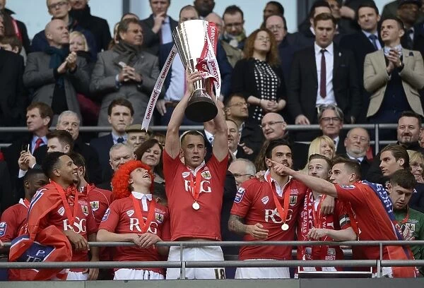 Bristol City Football Club: Aaron Wilbraham's Triumphant Lift of the Johnstone's Paint Trophy at Wembley Stadium (Bristol City v Walsall, JPT Final)