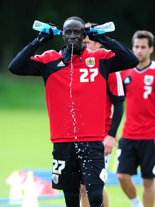 Framed Print : Bristol City Football Club: Albert Adomah Shares a Laugh During Training Framed Print : Bristol City Football Club: Albert Adomah Shares a Laugh During Training