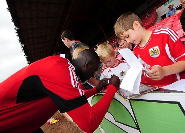 Bristol City Football Club: Albert Adomah Signs Autographs at Pre-Season Open Day