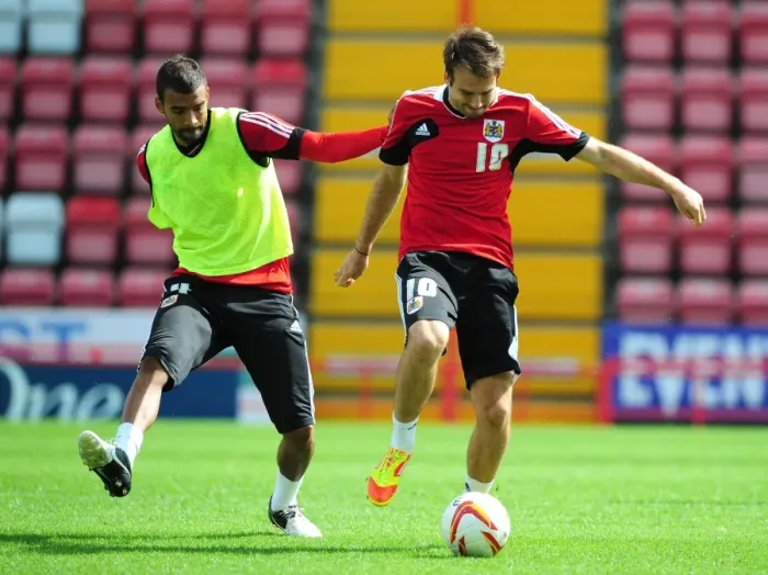 Framed Print : Bristol City Football Club: Brett Pitman vs. Liam Fontaine - A Battle for the Ball during Pre-Season Open Day