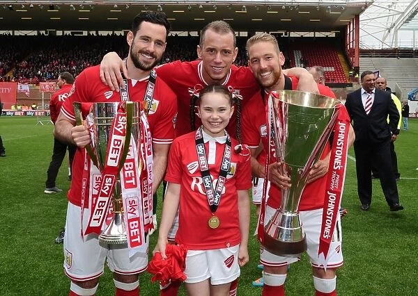 Bristol City Football Club: Champions League One and Johnstones Paint Trophy Victory Celebration - Scott Wagstaff, Greg Cunningham, and Aaron Wilbraham with Daughter