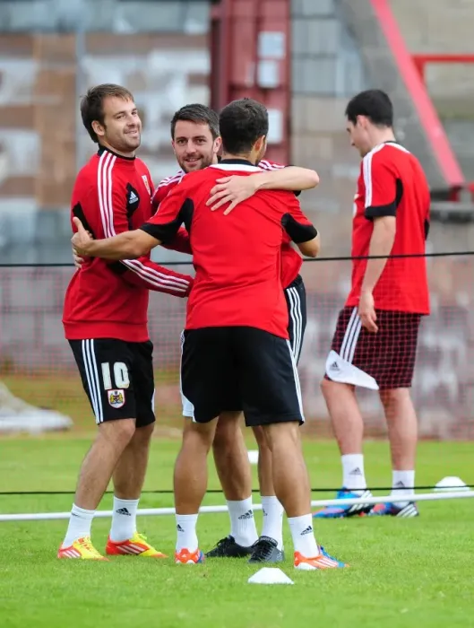 Framed Print : Bristol City Football Club: Cole Skuse and Brett Pitman Embrace During Pre-Season Training, Scotland Tour