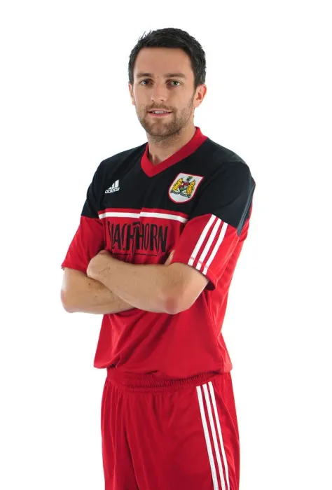 Framed Print : Bristol City Football Club: Cole Skuse's Intense Focus during Pre-Season Training at Ashton Gate Stadium
