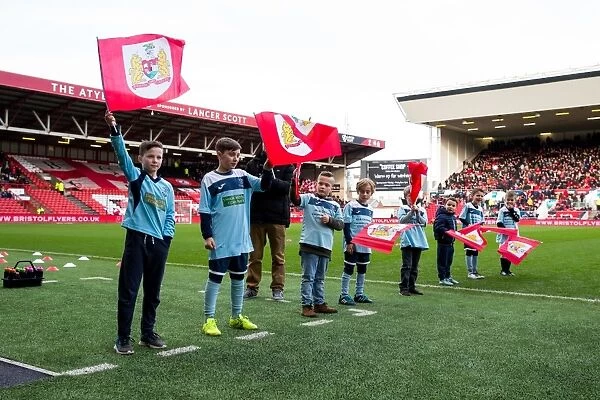 Bristol City Football Club: Flag-Bearing Fans in Action at Ashton Gate Stadium during Sky Bet Championship Match