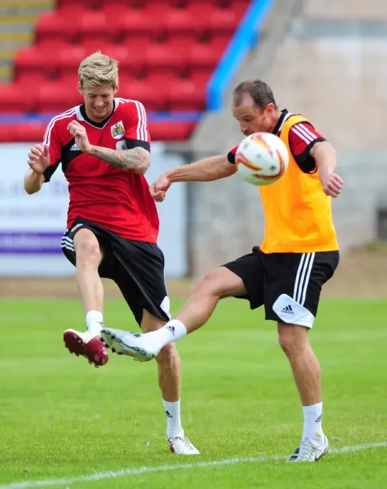 Framed Print : Bristol City Football Club: Jon Stead vs. Louis Carey - Intense Training Battle
