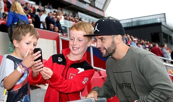 Bristol City Football Club: Lee Haskins Mingles with Fans at Ashton Gate Stadium during Derby County Match