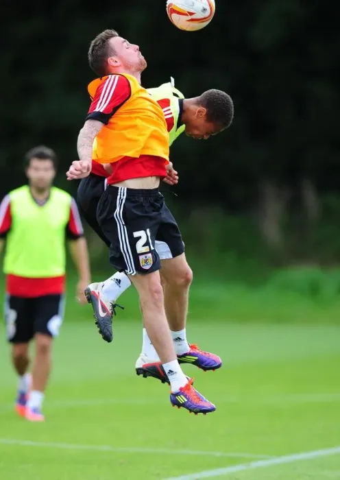 Framed Print : Bristol City Football Club: Paul Anderson and Bobby Reid Compete for High Ball during Training